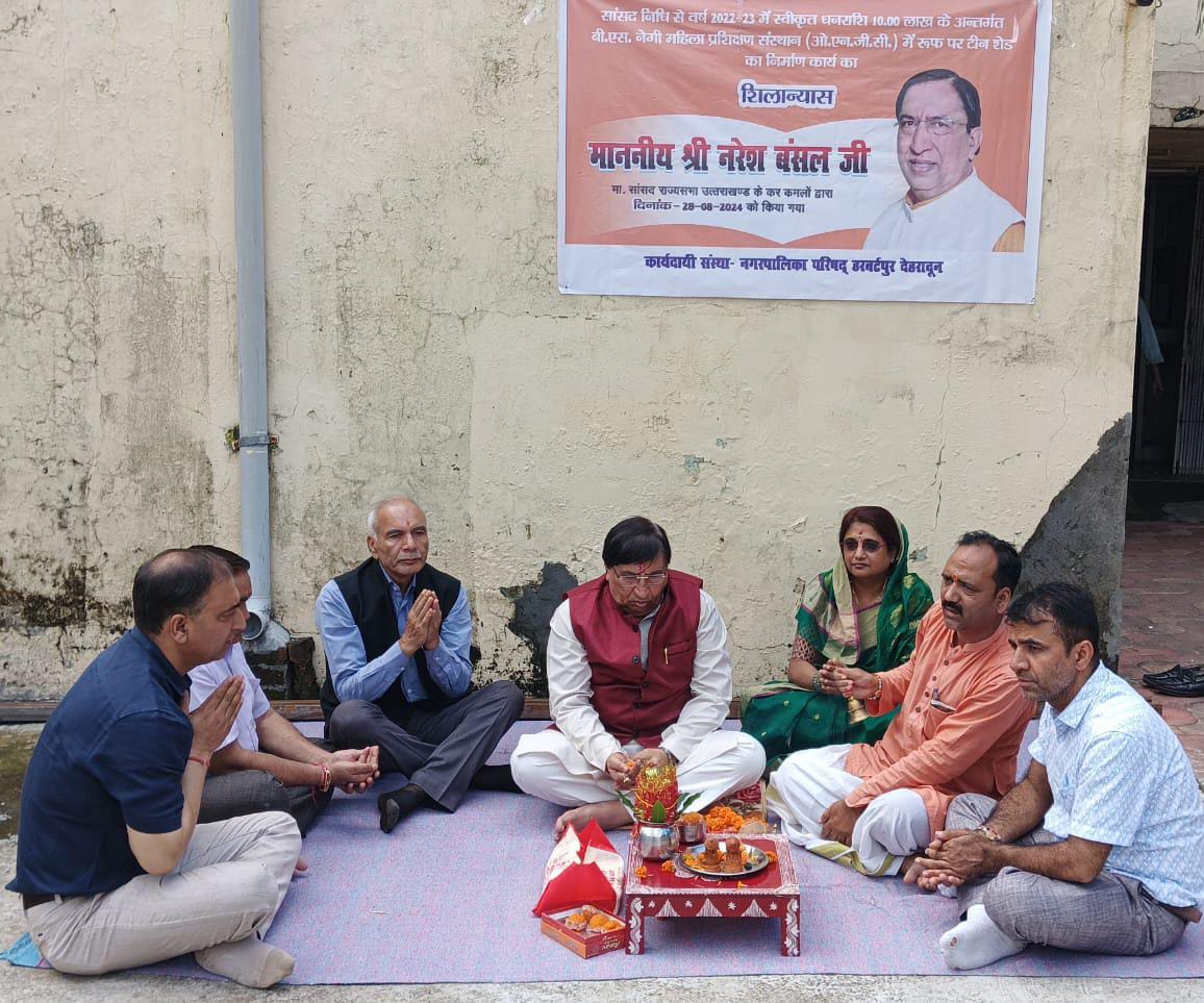 Foundation Puja Ceremony at B.S. Negi Hostel for tin shed on roof area